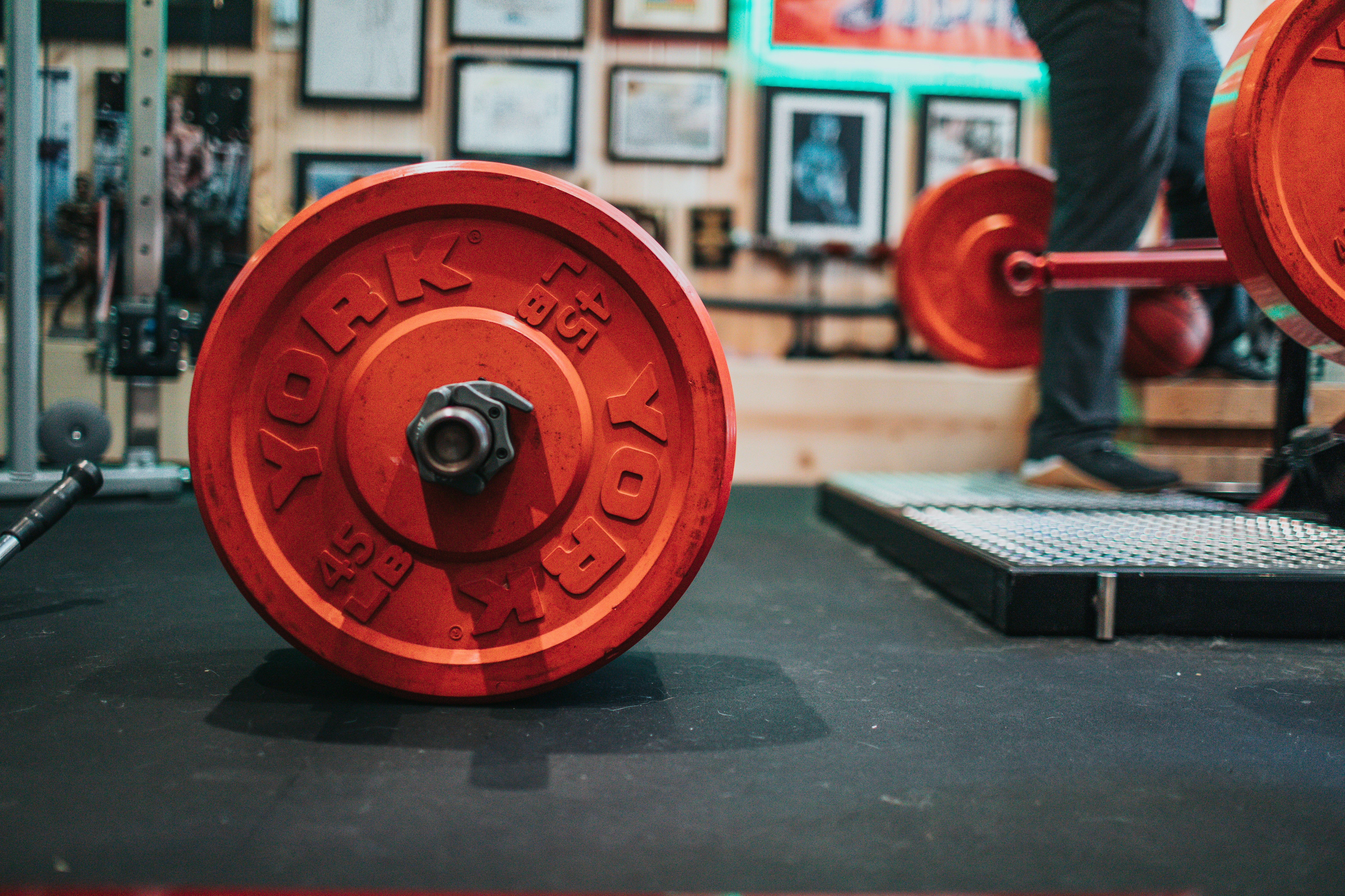 red round dumbbell on black table